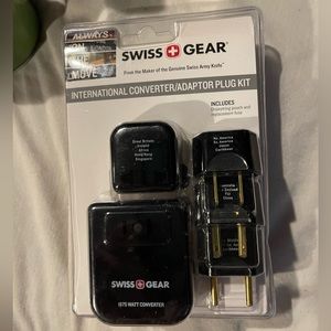 International converter/ plug kit adapter for travel by Swiss Gear. NWT